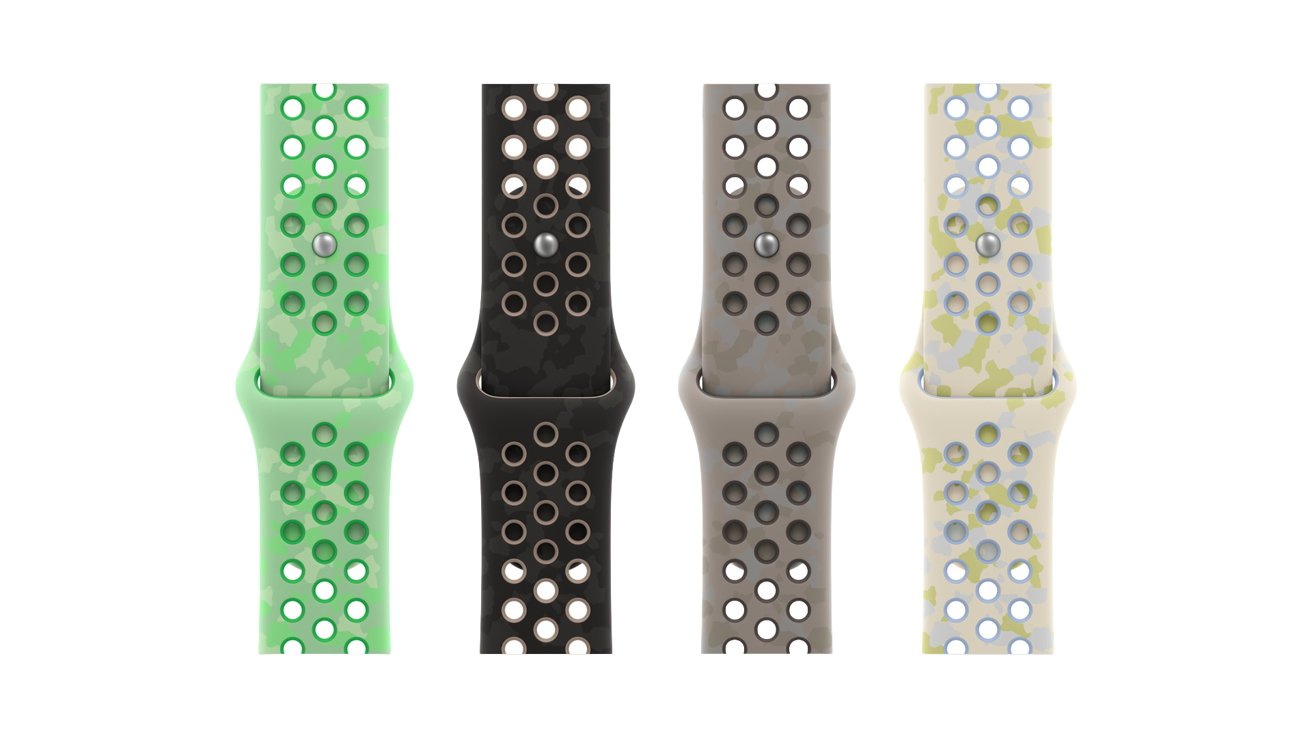 Four sporty smartwatch bands in green, black, gray, and cream with circular ventilation holes, shown vertically side by side against a plain white background