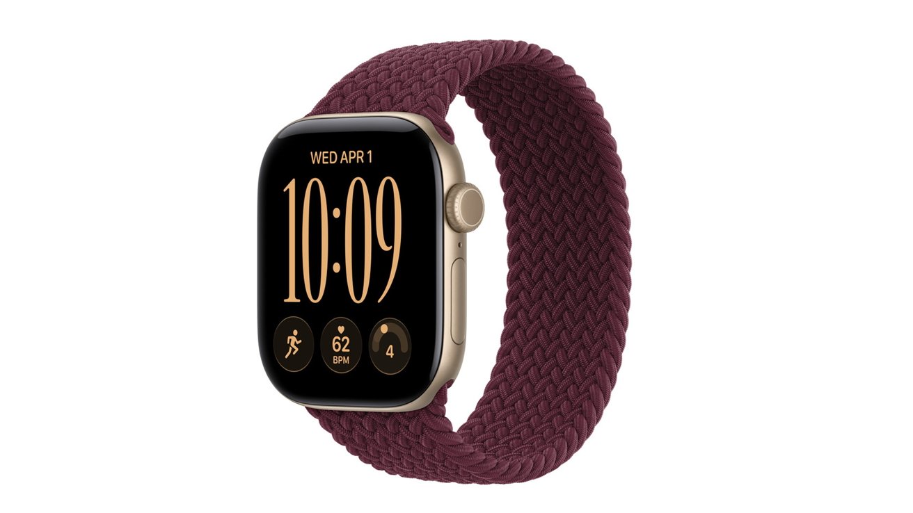 Gold smart watch with rectangular screen and burgundy braided loop band, displaying large digital time 10:09, date Wednesday April 1, and small workout, heart rate, and activity icons