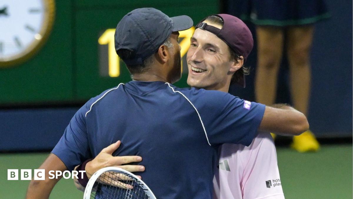 Joe Salisbury (right) hugs doubles partner Rajeev Ram