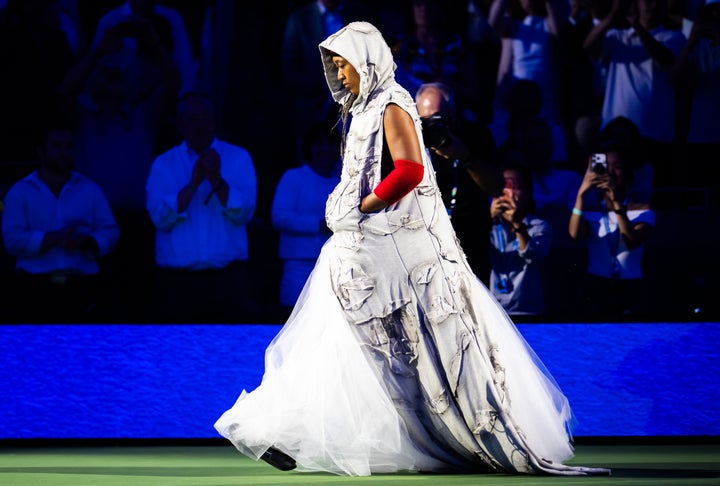 Japan’s Naomi Osaka walks out in an Allen Iverson-inspired outfit before her win against Anastasia Zakharova in the first round of the U.S. Open last week.