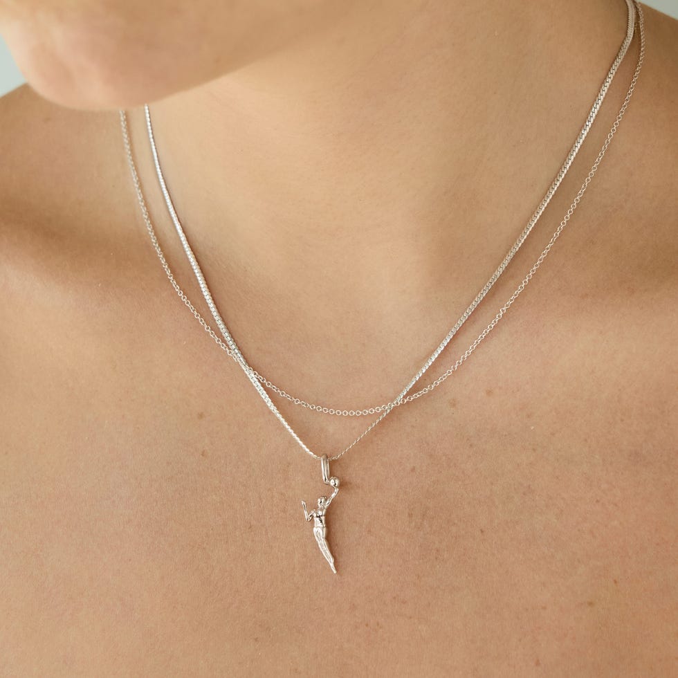 Jumpwoman Silver Charm