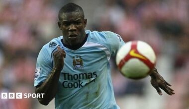 Micah Richards celebrates with members of the Manchester City staff after Sergio Aguero's goal against Queens Park Rangers in 2012