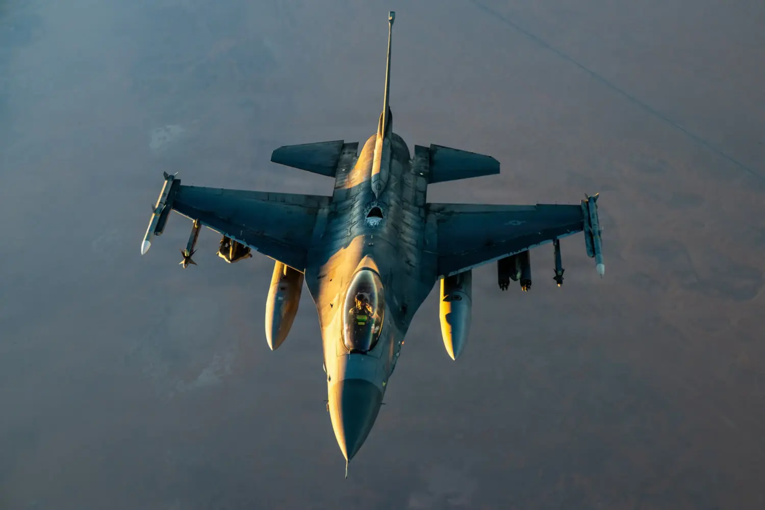 A U.S. Air Force F-16 Fighting Falcon aircraft flies in the U.S. Central Command area of responsibility on Sept. 5, 2026. The Texas Military Department said an F-16 crash landed near Interlochen Thursday while conducting routine training exercises.