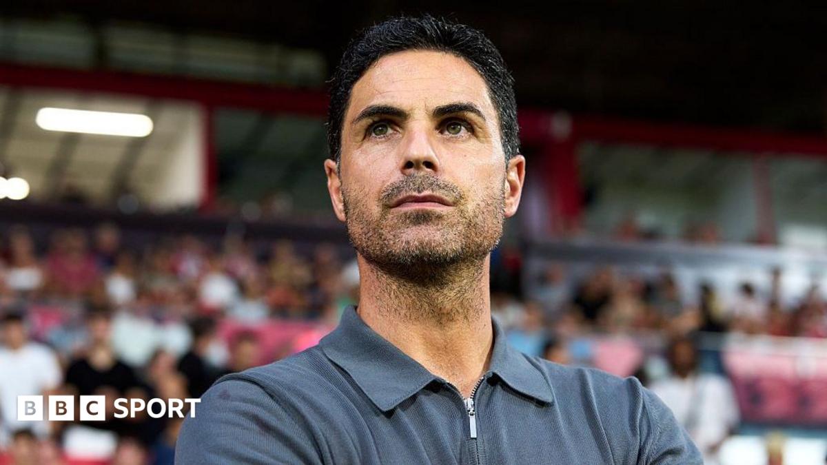 Mikel Arteta pictured on the touchline looking into the distance