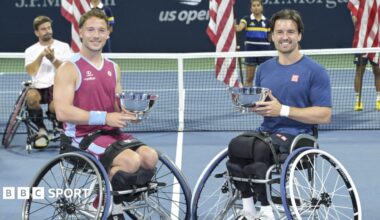 Alfie Hewett and Gordon Reid hold the US Open men's wheelchair doubles trophies
