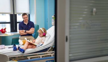 Olivia Eaton and her father, Matt, sat in a hospital room for an appointment at Boston Children’s Hospital on Aug. 8.