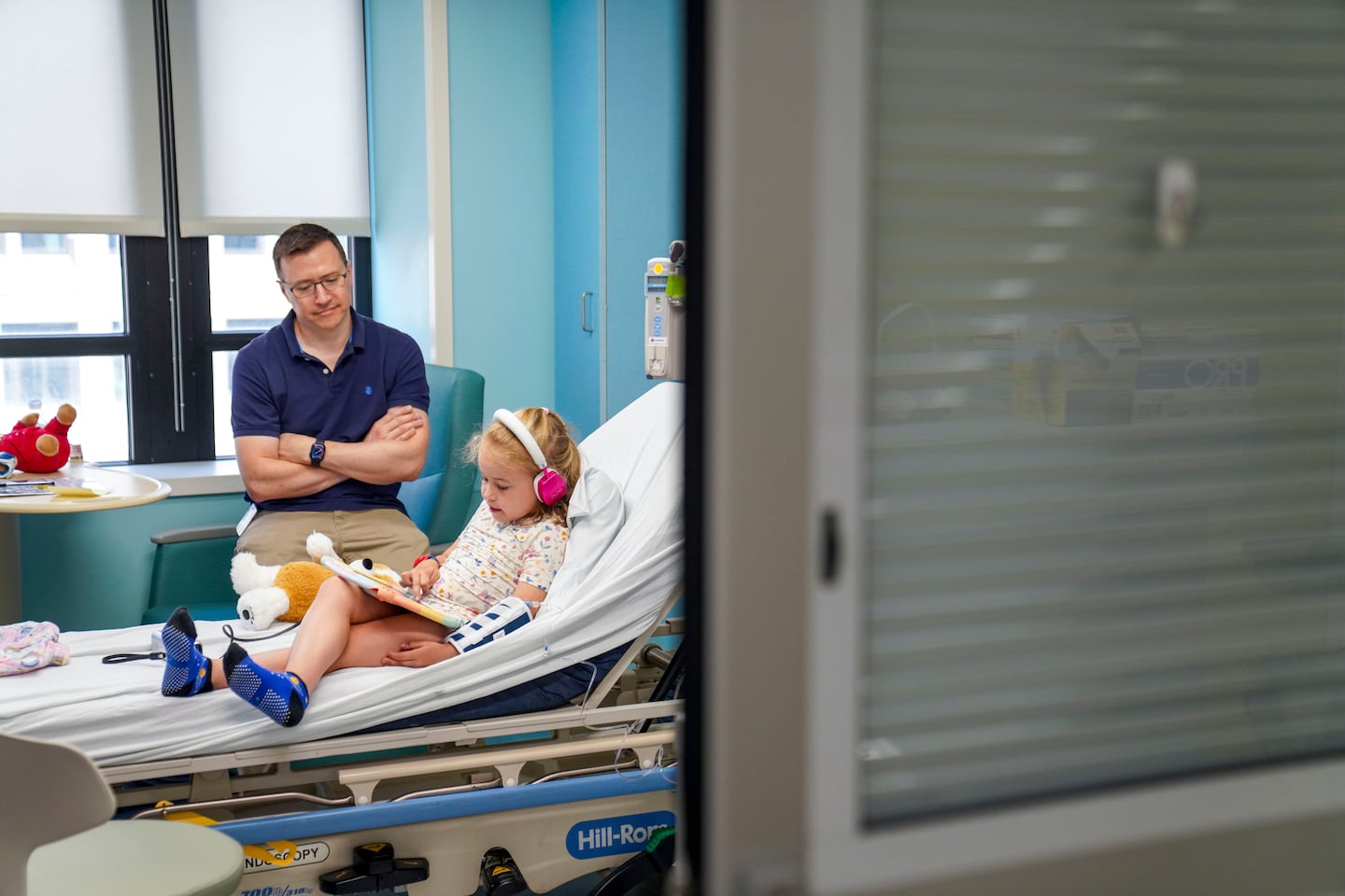 Olivia Eaton and her father, Matt, sat in a hospital room for an appointment at Boston Children’s Hospital on Aug. 8.