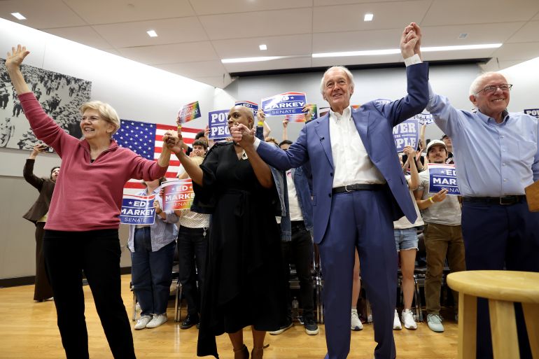 Sen. Elizabeth Warren, Rep. Ayanna Pressley, D-Mass., Sen. Ed Markey, D-Mass. and Sen. Bernie Sanders, I-VT., , left to right, wave to attendees during a Get Out the Vote event supporting Markey, Saturday, Aug. 29, 2026 in Boston. (AP Photo/Mark Stockwell)