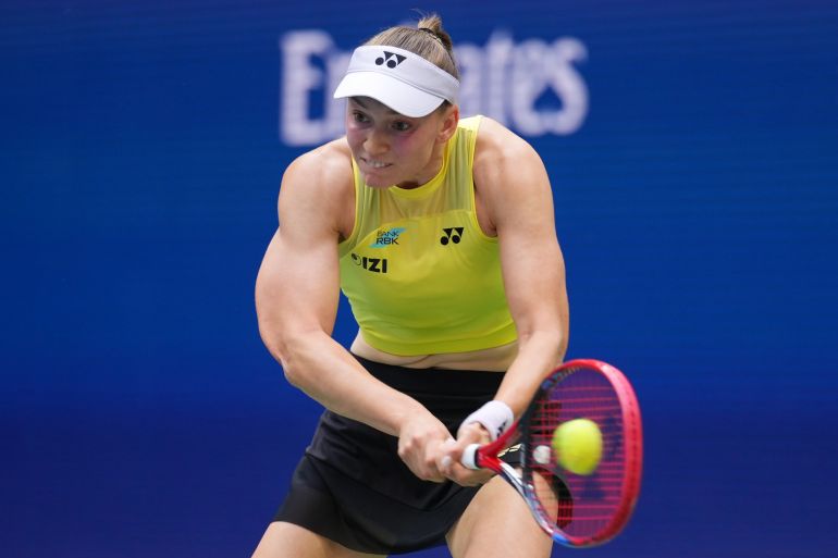 Elena Rybakina, of Kazakhstan, returns the ball to Aryna Sabalenka, of Belarus, during the women's singles final of the U.S. Open tennis championships Saturday, Sept. 12, 2026, in New York. (AP Photo/Kirsty Wigglesworth)