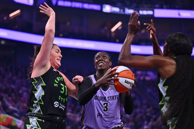 Golden State Valkyries' Laeticia Amihere (3) drivees against Seattle Storm's Stefanie Dolson (31) in the first quarter of their WNBA game at Chase Center in San Francisco, Calif., on Saturday, Sept. 19, 2026. (Jose Carlos Fajardo/Bay Area News Group)