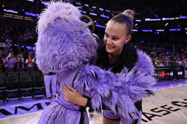Golden State Valkyries' Juste Jocyte (4) hugs team mascot Violet after their WNBA game at Chase Center in San Francisco, Calif., on Saturday, Sept. 19, 2026. The Golden State Valkyries defeated the Seattle Storm 70-57. (Jose Carlos Fajardo/Bay Area News Group)