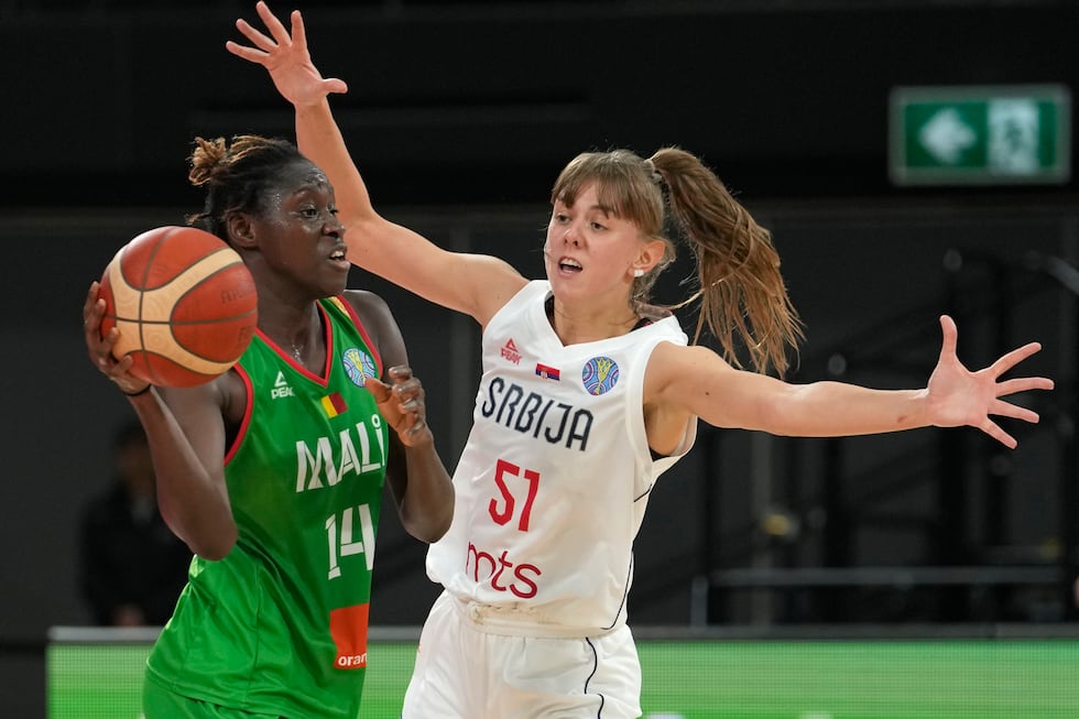 Serbia's Mina Dordevic, right, defends against Mali's Sika Kone during their game at the...