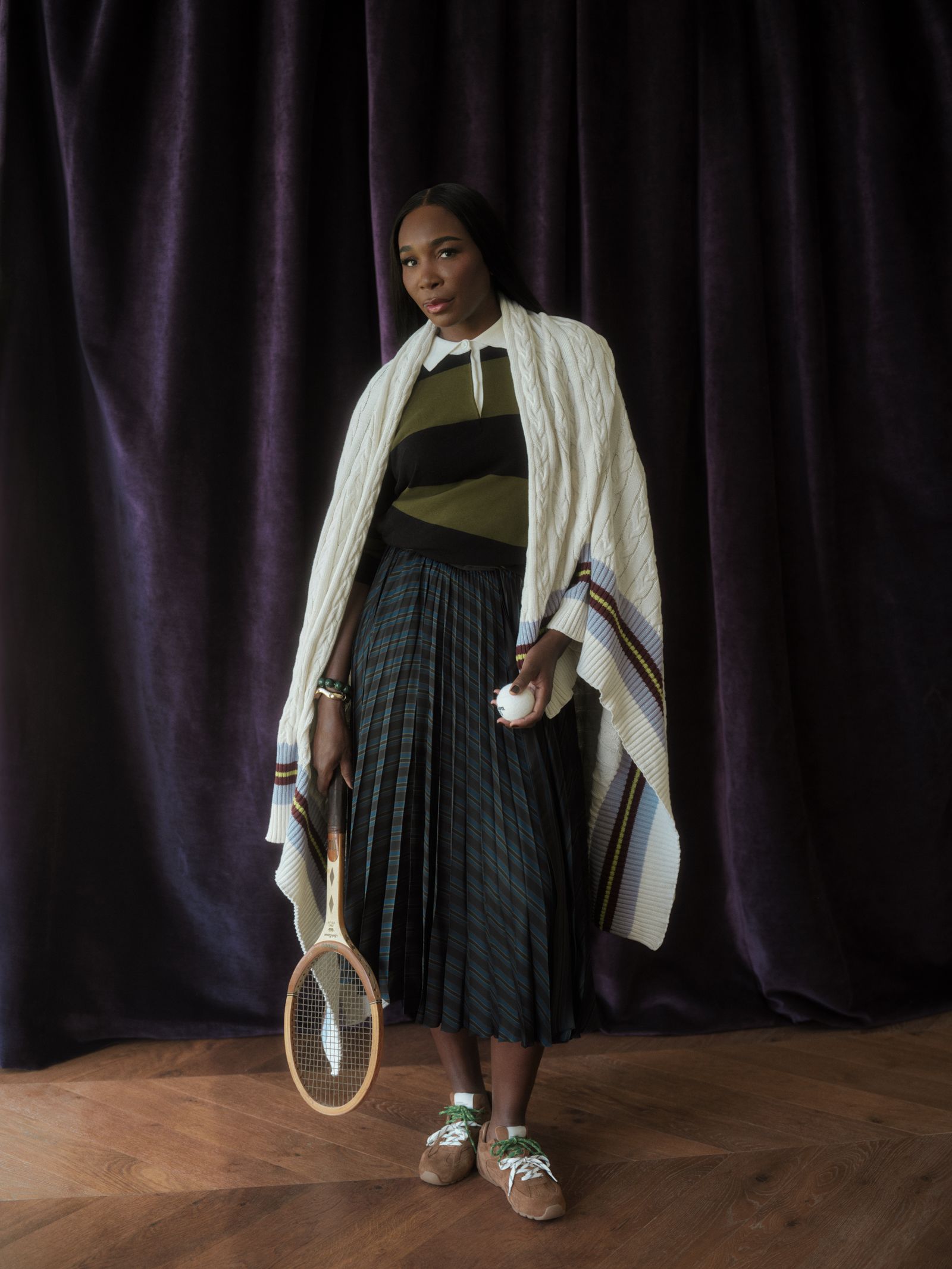 Image may contain Venus Williams Adult Person Racket Sport Tennis Tennis Racket and Fashion