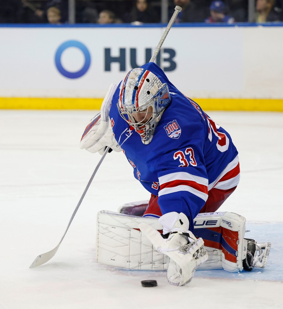 Dylan Garand makes a save during the Rangers' 3-2 loss to the Jets on March 22, 2026 at the Garden.