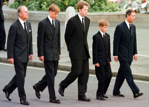 Earl Spencer (center) with Prince William, Prince Harry and Prince Charles walk outside Westminster Abbey during the funeral service for Diana, Princess of Wales in 1997.