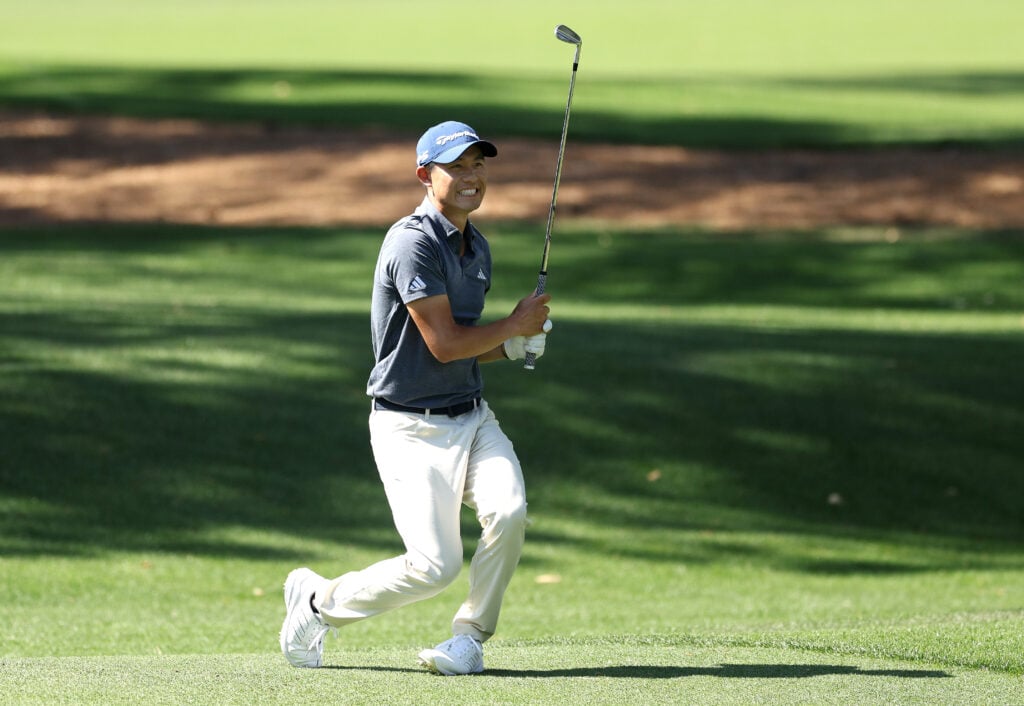 Collin Morikawa of the United States plays his shot on the seventh hole during the final round of the 2024 Masters Tournament at Augusta National