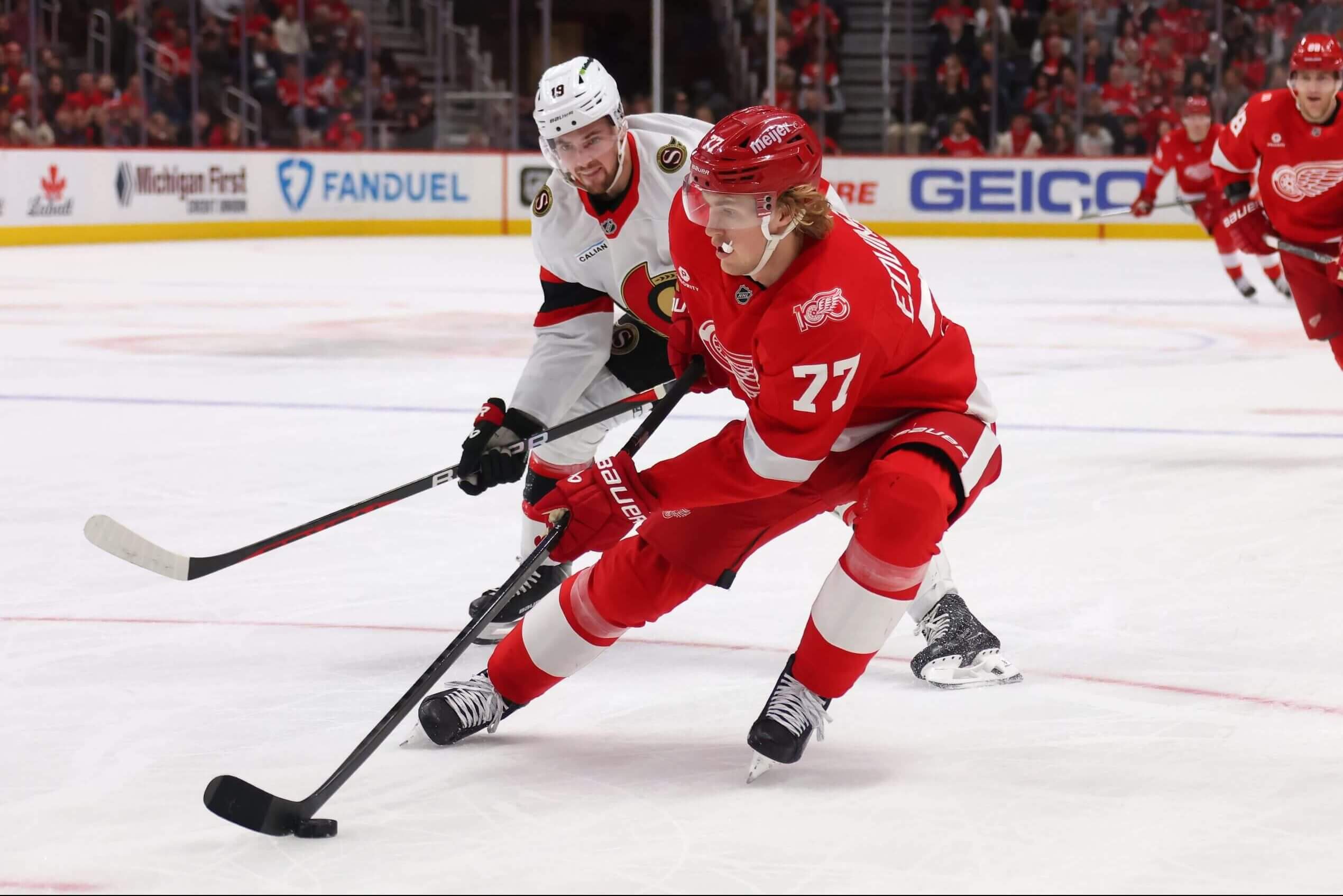 Detroit's Simon Edvinsson (77) makes a move with the puck during a game against Ottawa.