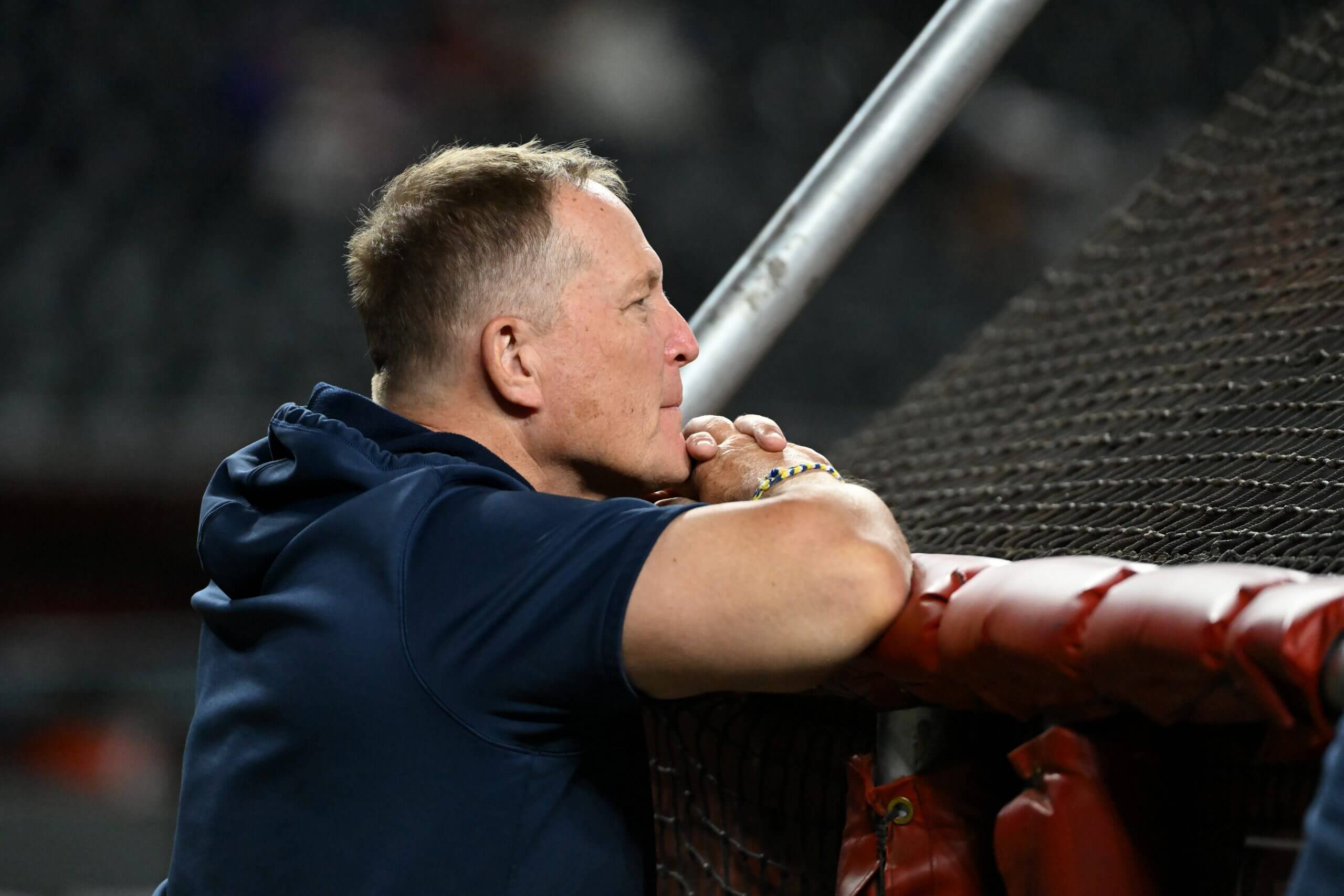 Brewers manager Pat Murphy looks on.