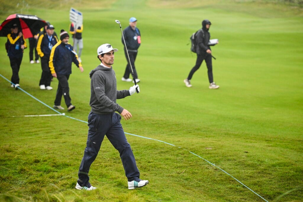 Joaquin Niemann hits an approach during the first round of the Irish Open