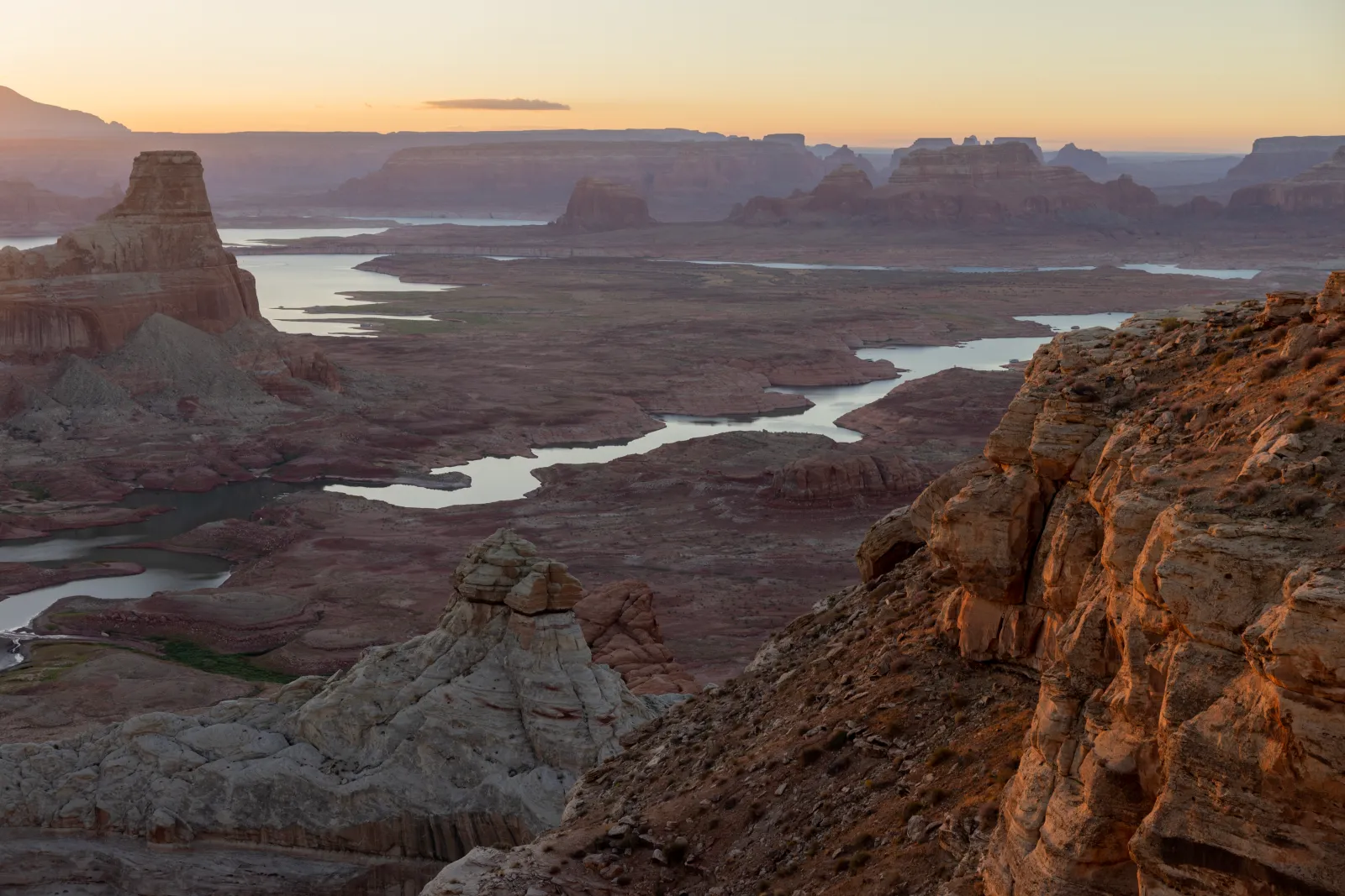 Land and geologic formations, underwater since the 1960s, when Lake Powell was created, reemerge for the first time, September 4, 2026 near Page, Arizona.