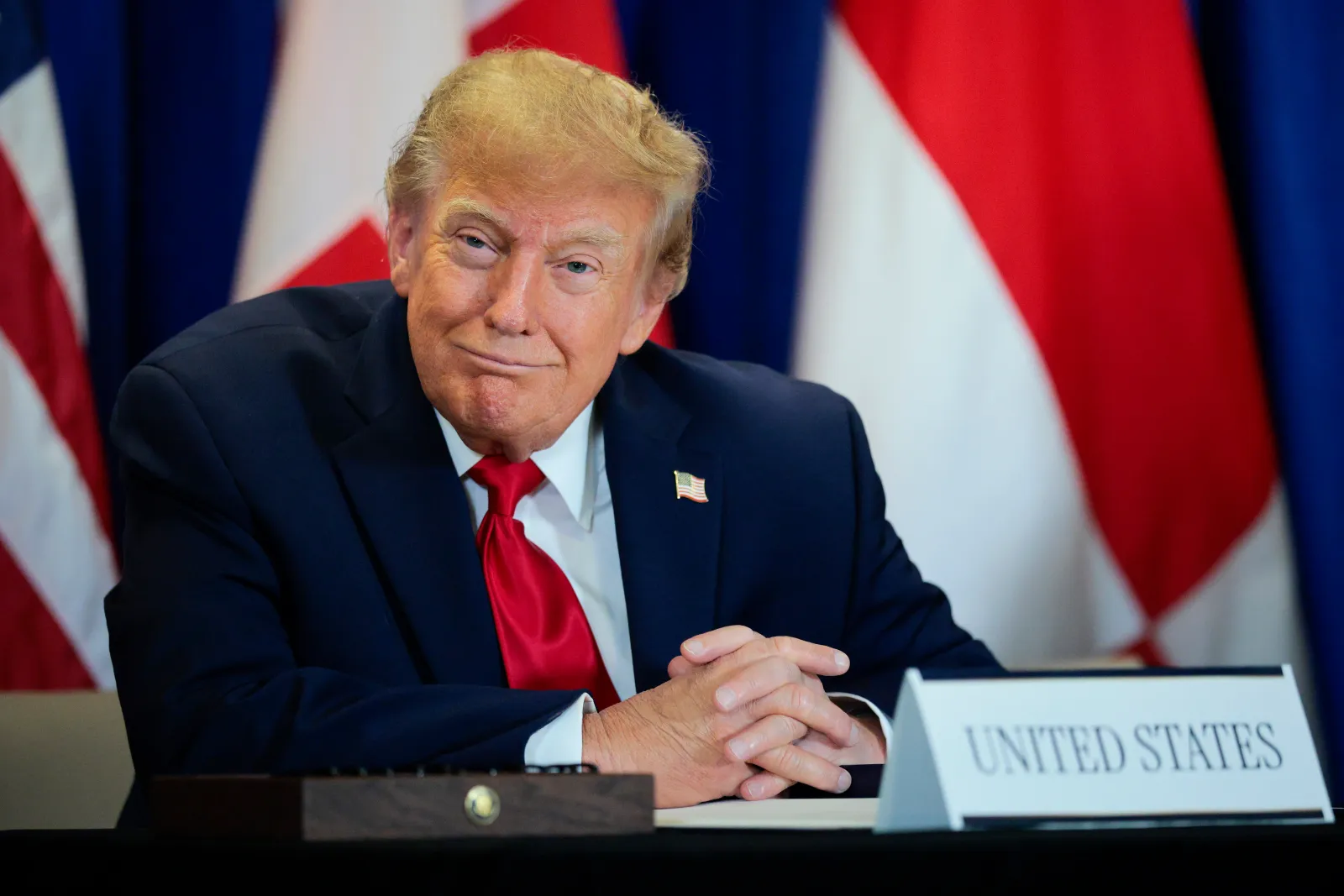 U.S. President Donald Trump looks on during the signing of a security pact between the U.S., Denmark and Greenland during the 81st session of the U.N. General Assembly on September 22 in New York City. Trump has recently criticized Canada's unemployment rate.