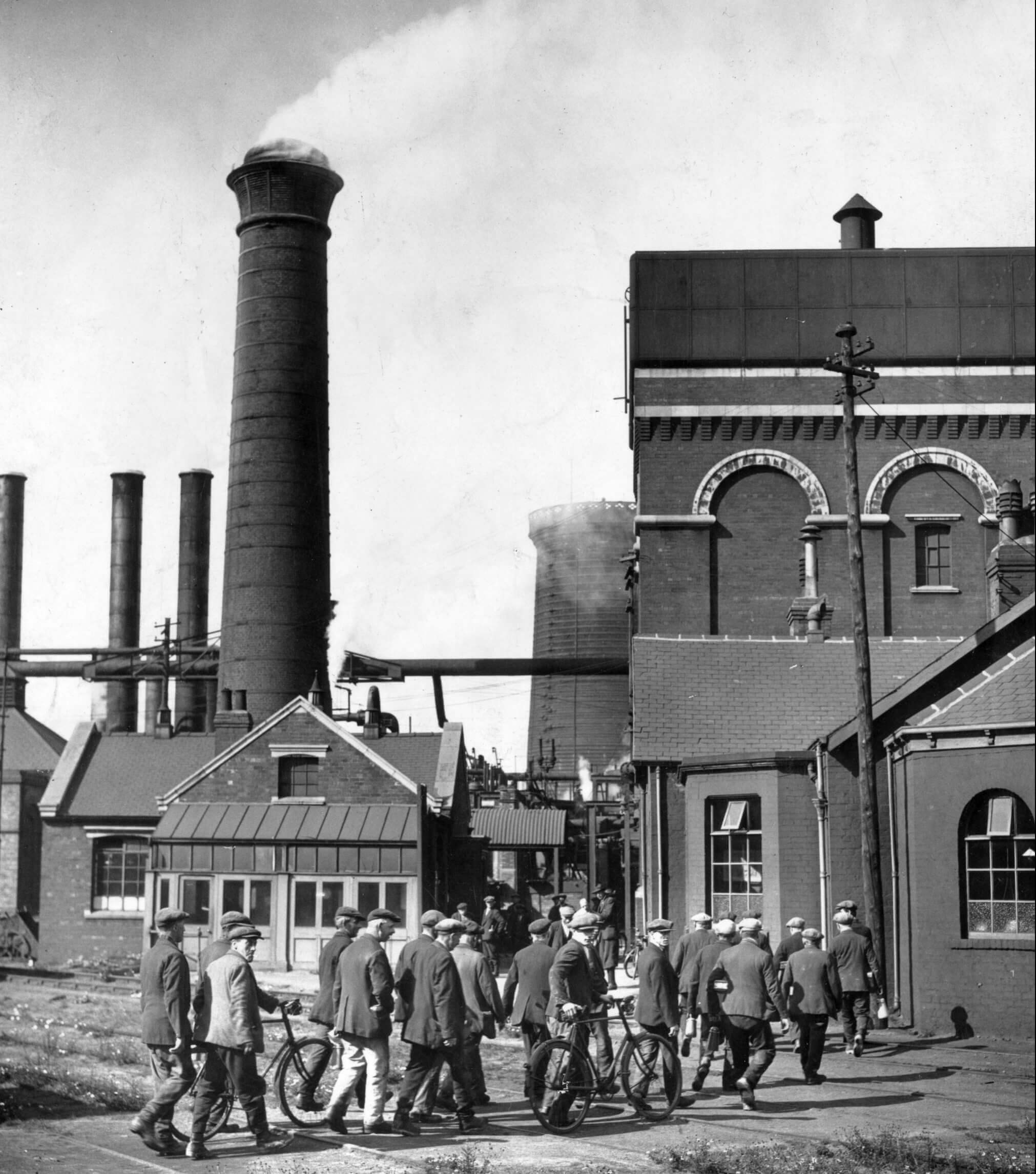 Workers arrive at a Middlesbrough steelworks in 1961