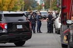 Law enforcement officers gather at the scene of a "critical incident" at the Chestnut Tree Inn in Portland.