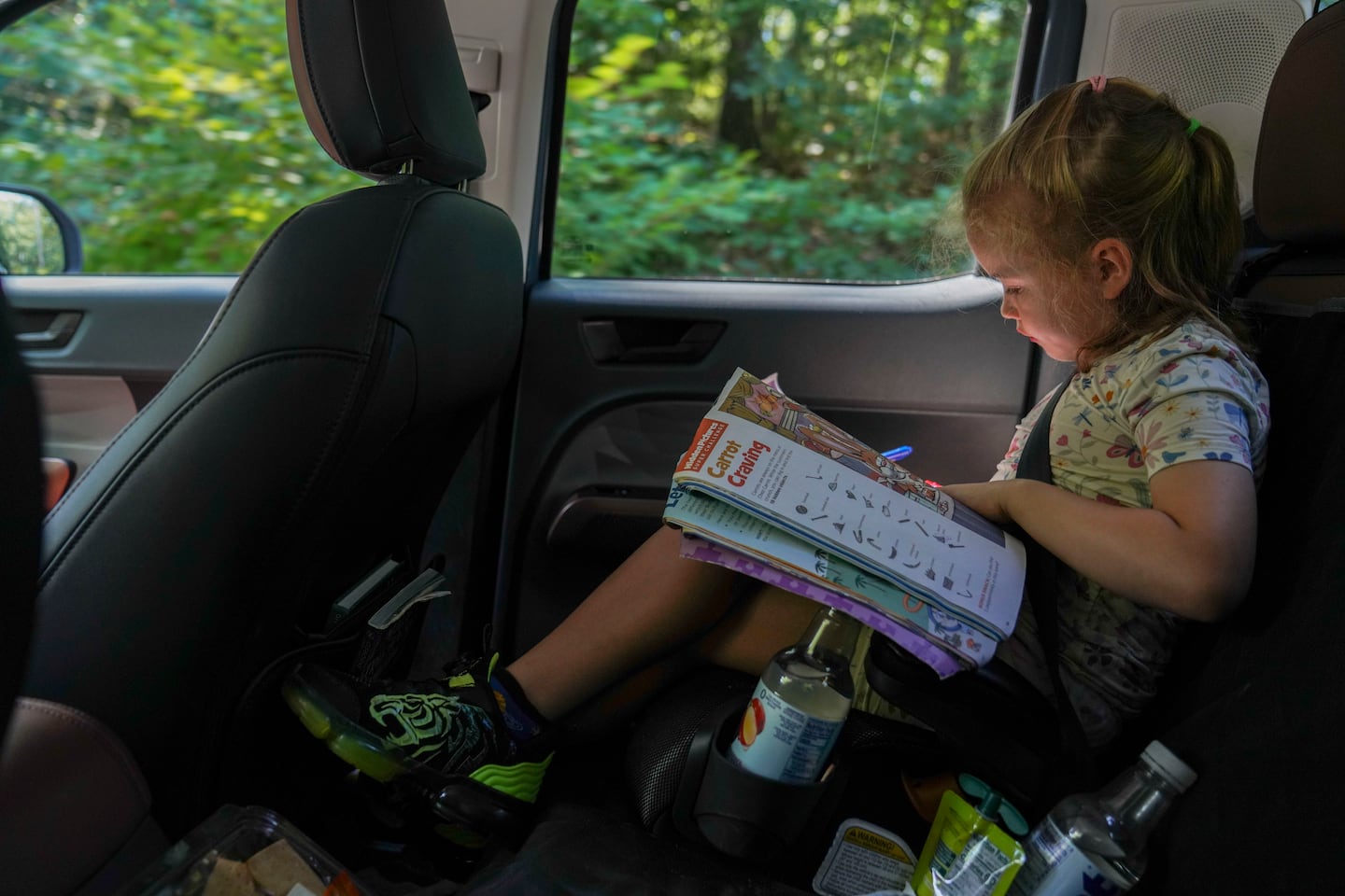 “Olivia, are you going to remind me where to turn?” her father asked on the way to an August appointment at Boston Children's Hospital. Focused on a workbook, she promptly responded, “I might be looking at this.”