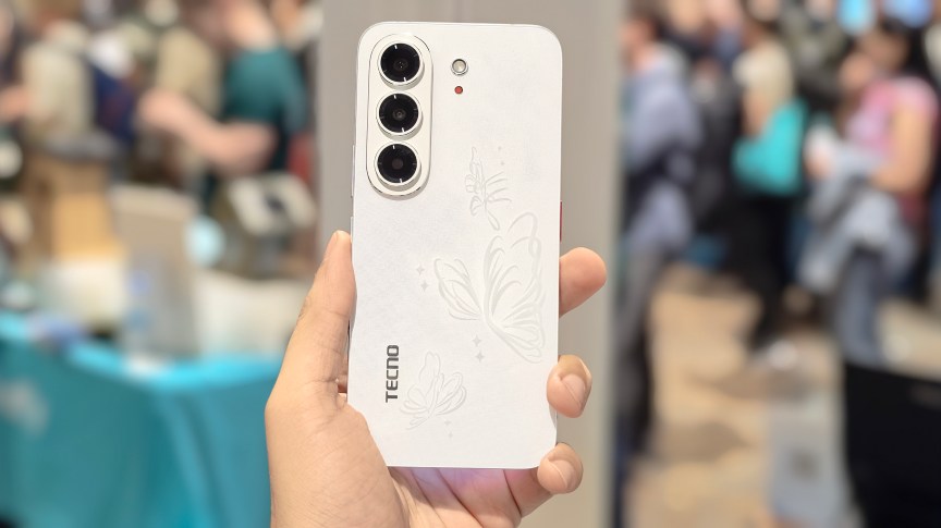 Prakhar Khanna holding the Tecno Next-Gen Bezelless Concept Phone