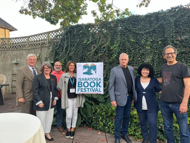 From Left to right: John Safford, Ellen Beal, Steve Rosenblum, Jennifer Allen, Phil Bayly, Catherine Bruns and Matt Witten at the 2024 Saratoga Book Festival kickoff event. (Emma Ralls - Medianews Group)