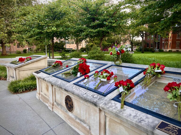 The Benjamin Harrison Presidential Site in Indianapolis continued its Constitutional Day tradition of placing roses on the Charters of Freedom display located on the Sarah Evans Barker Citizenship Plaza on the grounds of the Harrison home. (Photo/courtesy of the Benjamin Harrison Presidential Site)