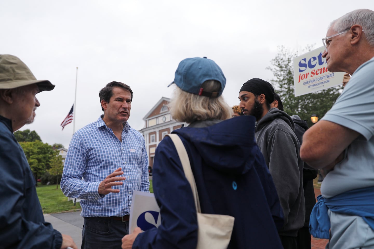 US Representative Seth Moulton campaigned outside Cary Hall, the town hall and polling place in Lexington, Mass., on Tuesday.