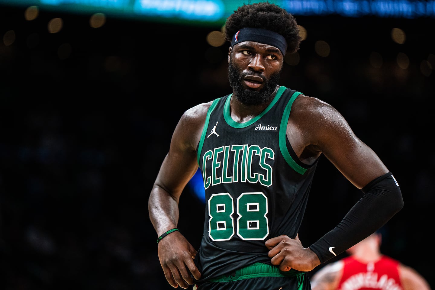 Celtics center Neemias Queta's No. 88 was painted large on a Cambridge basketball court.