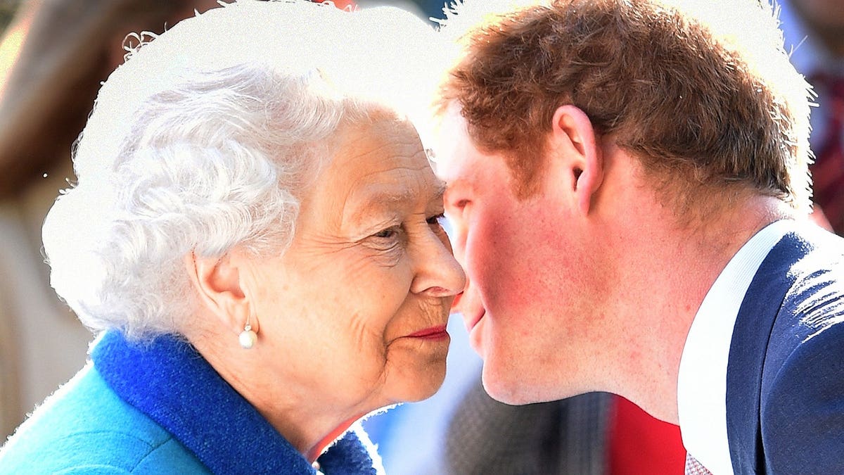 Queen Elizabeth II and Prince Harry attend the Chelsea Flower Show in London.