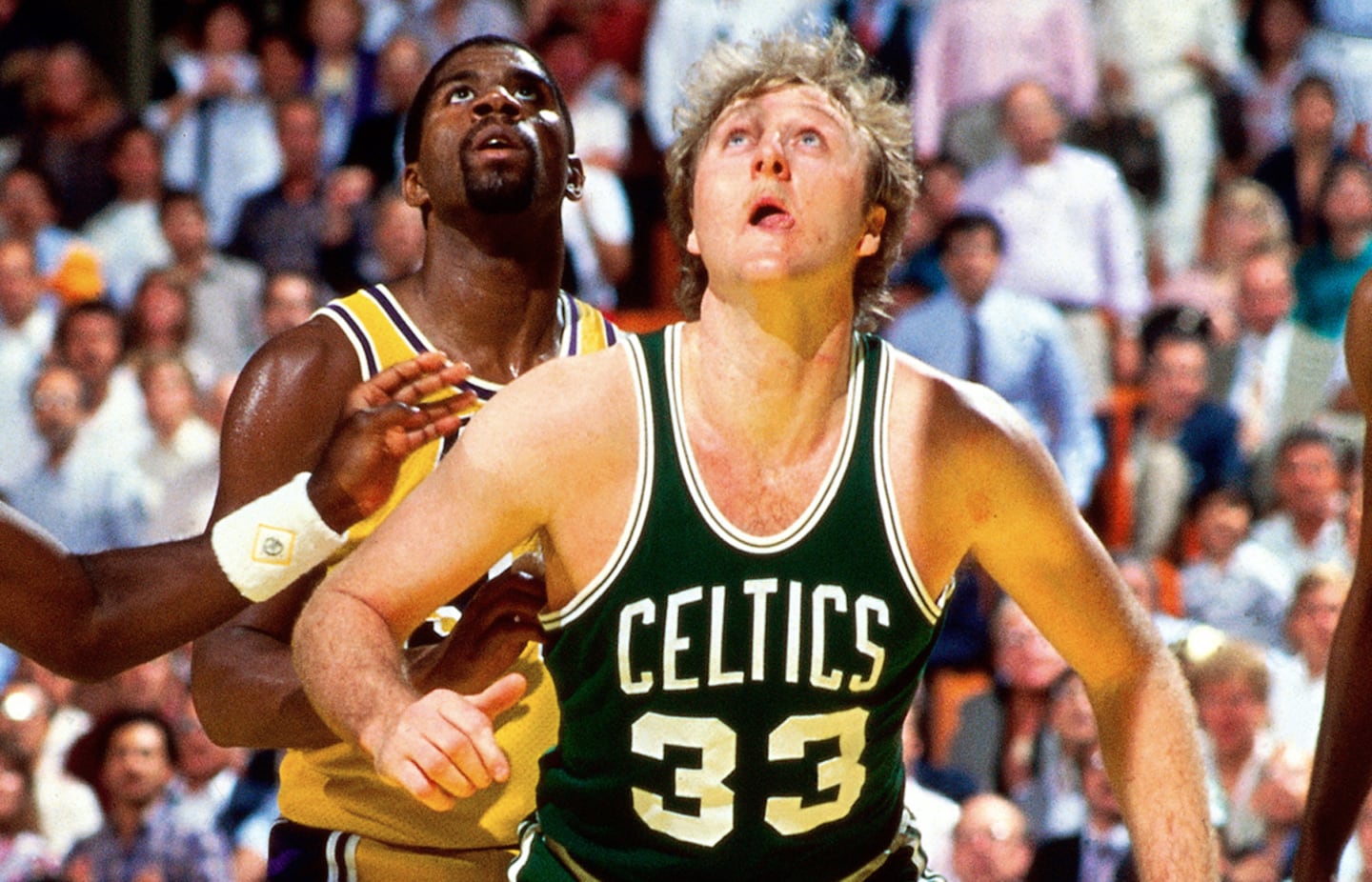 Magic Johnson (Lakers) and Larry Bird (Celtics) each played with only one NBA team.