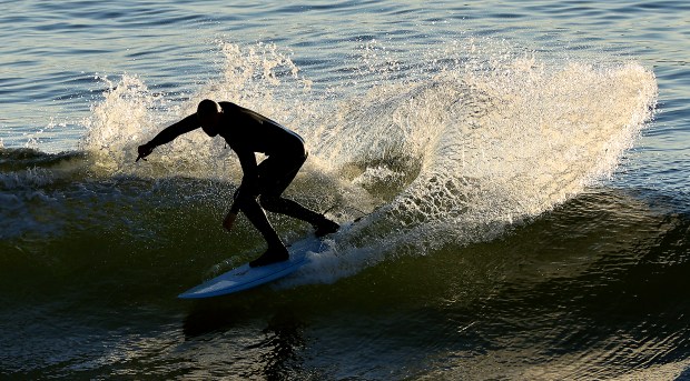 A surfer cuts through a wave at Salmon Creek State Beach North, Tuesday, September 8, 2026. (Kent Porter / The Press Democrat)