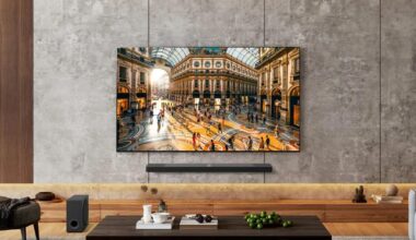 LG's 83-inch OLED B5 2025 TV. mounted onto a gray wall.