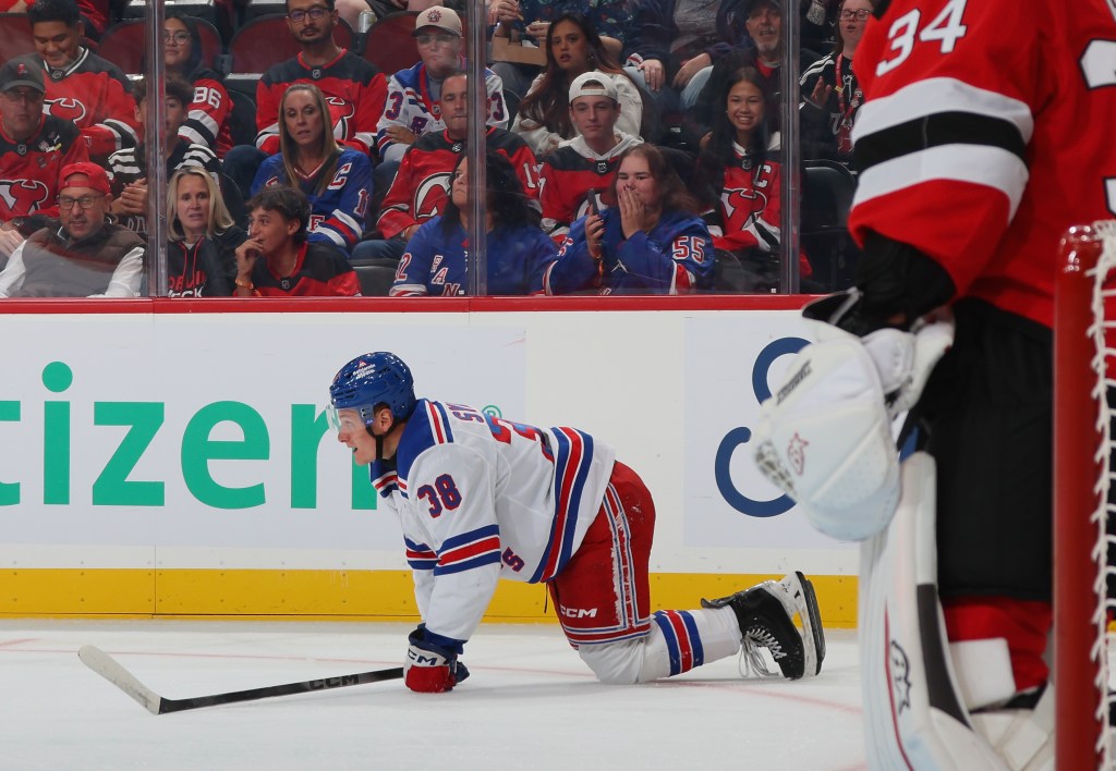 Adam Sykora (38) of the Rangers is injured during the first period of a game against the New Jersey Devils at the Prudential Center, Monday, Sept. 21, 2026, in Newark, New Jersey.