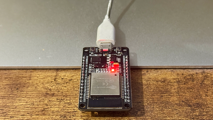 An ESP32 with the red LED lit up acting as an internet status light.
