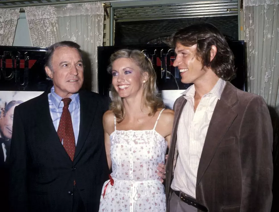 Actor Gene Kelly, singer Olivia Newton-John and actor Michael Beck attend the