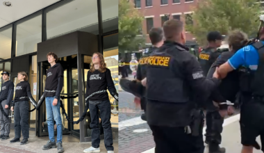 9 arrested after protesters chain themselves to Kroger headquarters
