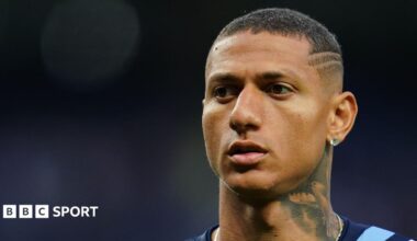 Close-up picture of Richarlison, showing his head and neck, which features a large tattoo of a pigeon