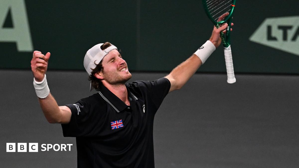 Toby Samuel celebrates winning Davis Cup match