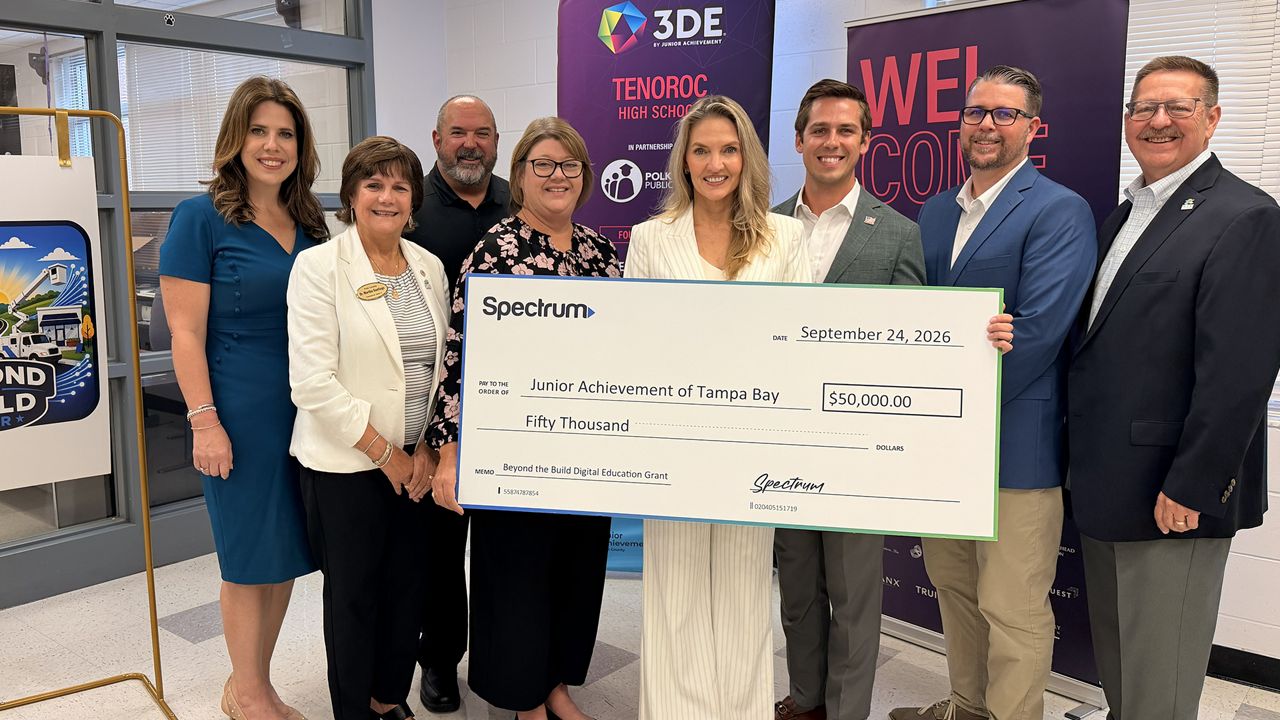 Check presentation for $50,000 to Junior Achievement of Tampa Bay.