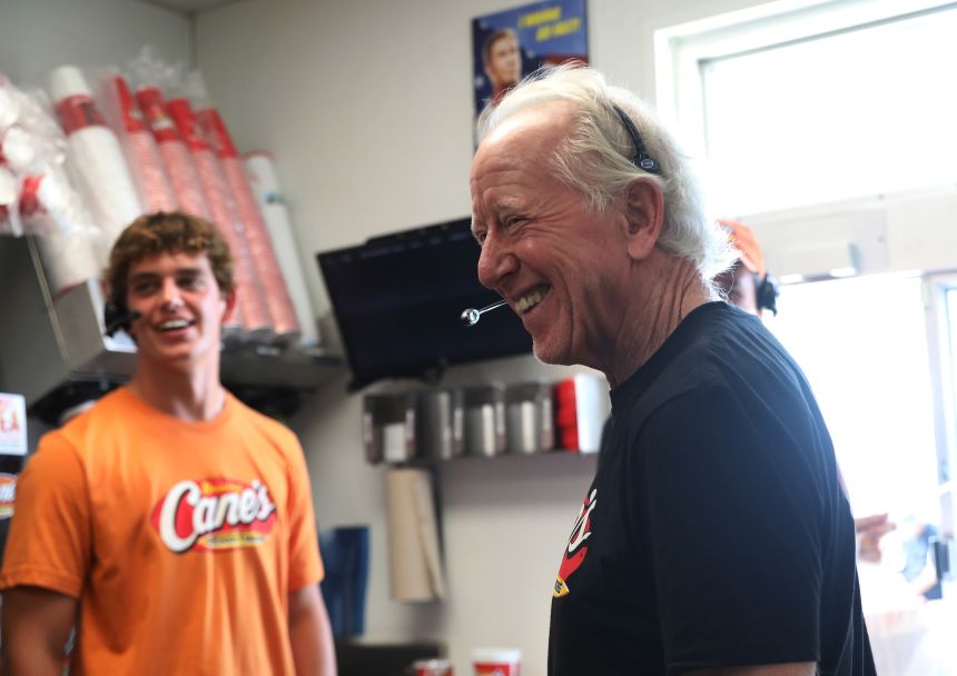Archie Manning, and Arch Manning work a Pre-Manning Passing Academy
