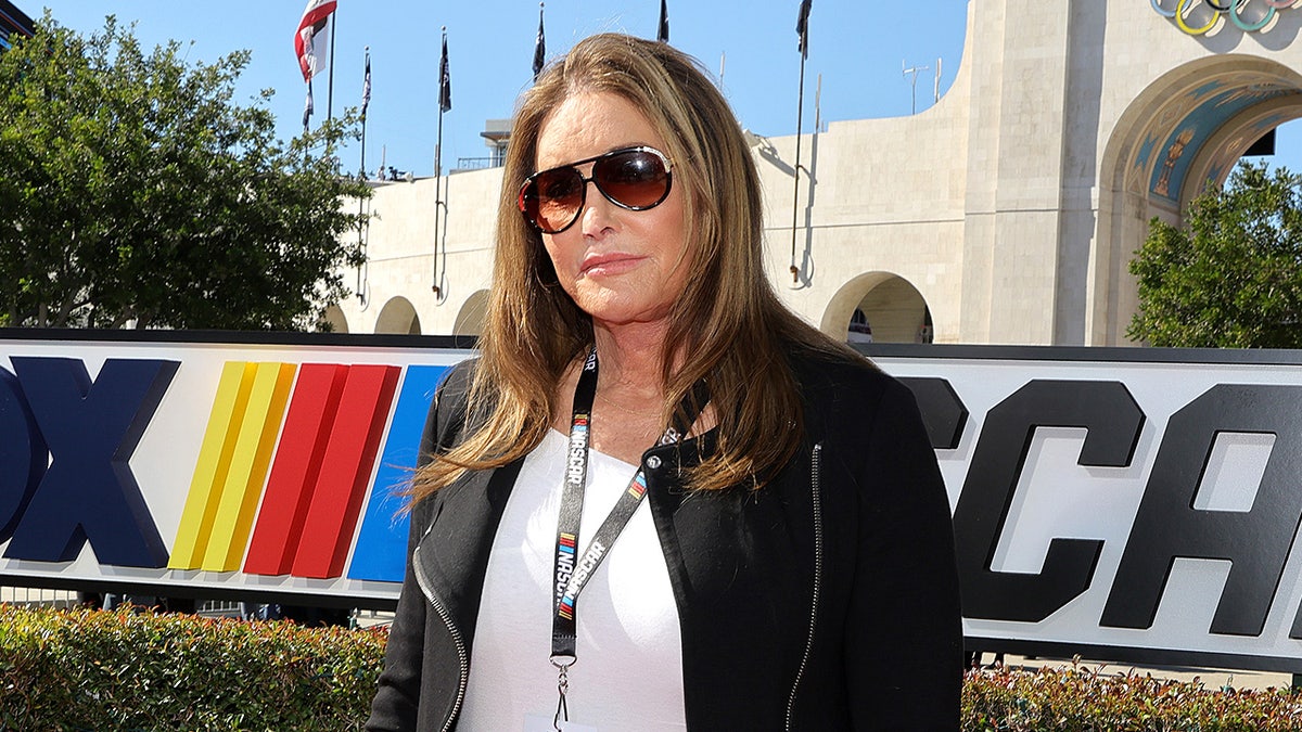 Caitlyn Jenner smiles while attending NASCAR’s Busch Light Clash at the Los Angeles Coliseum.
