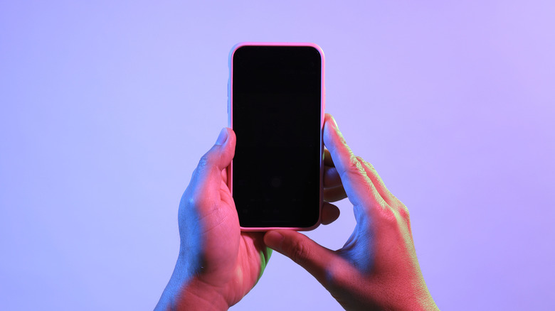Person holding smartphone