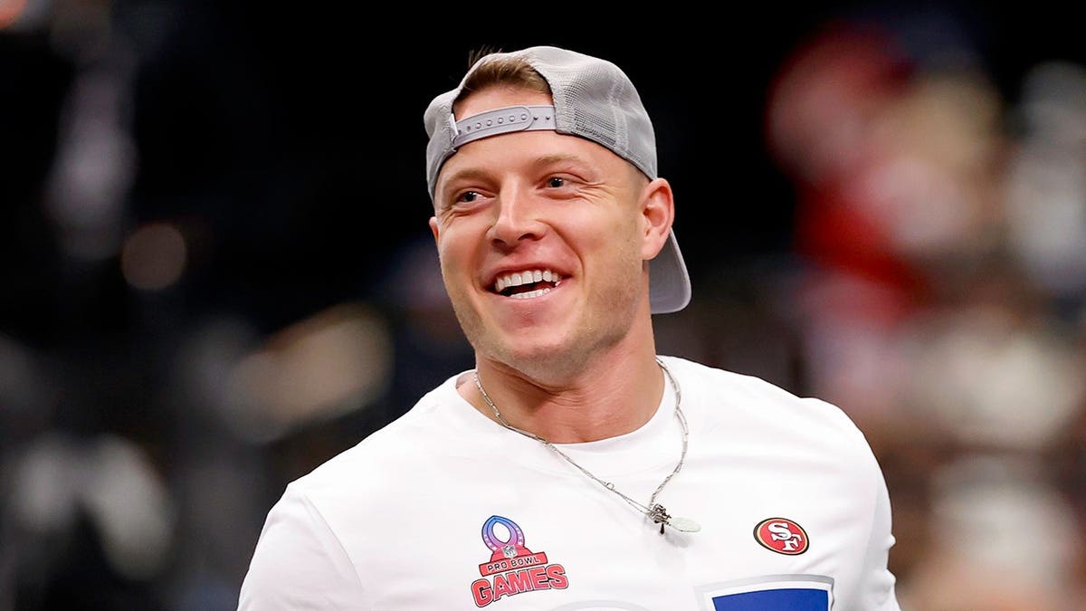 Christian McCaffrey smiles after scoring a touchdown during the Pro Bowl game in San Francisco.