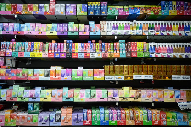 A selection of disposable vapes for sale in a convenience store.