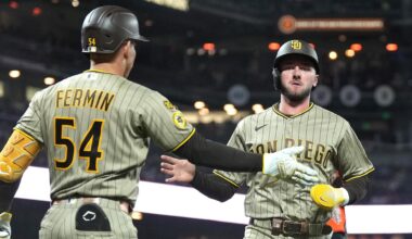 Ray gets 100th career win as Padres hold off Giants 7-5 to maintain wild-card edge